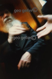 Giving: Rebbe-Schneerson - i took this photo in late 1980's - well actually the photo took itself and i recently discovered it - or maybe it discovered me - in  it's my hand reaching out and the Rebbe hand giving - 